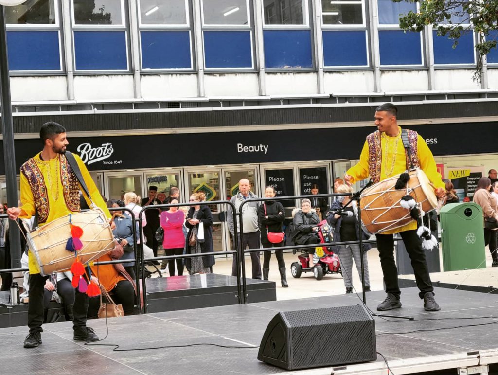 two people playing the drums at stevenage international day 2021